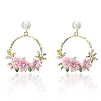 Aretes de Flores y Perlas en Oro