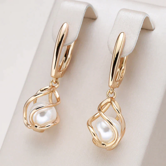 Aretes Elegantes de Perlas en Oro